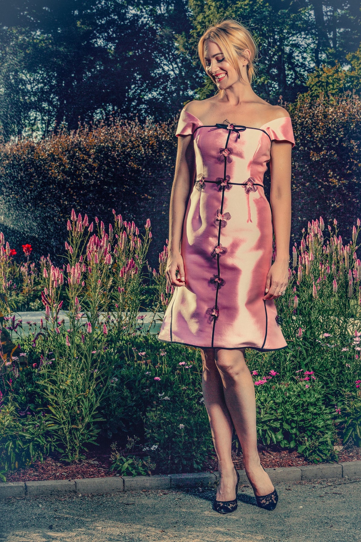 anna nieman designer dress Boston. Fantasia was inspired by my cherry tree blooming so beautifully every May in my garden. The black trim defines the beautiful feminine form.